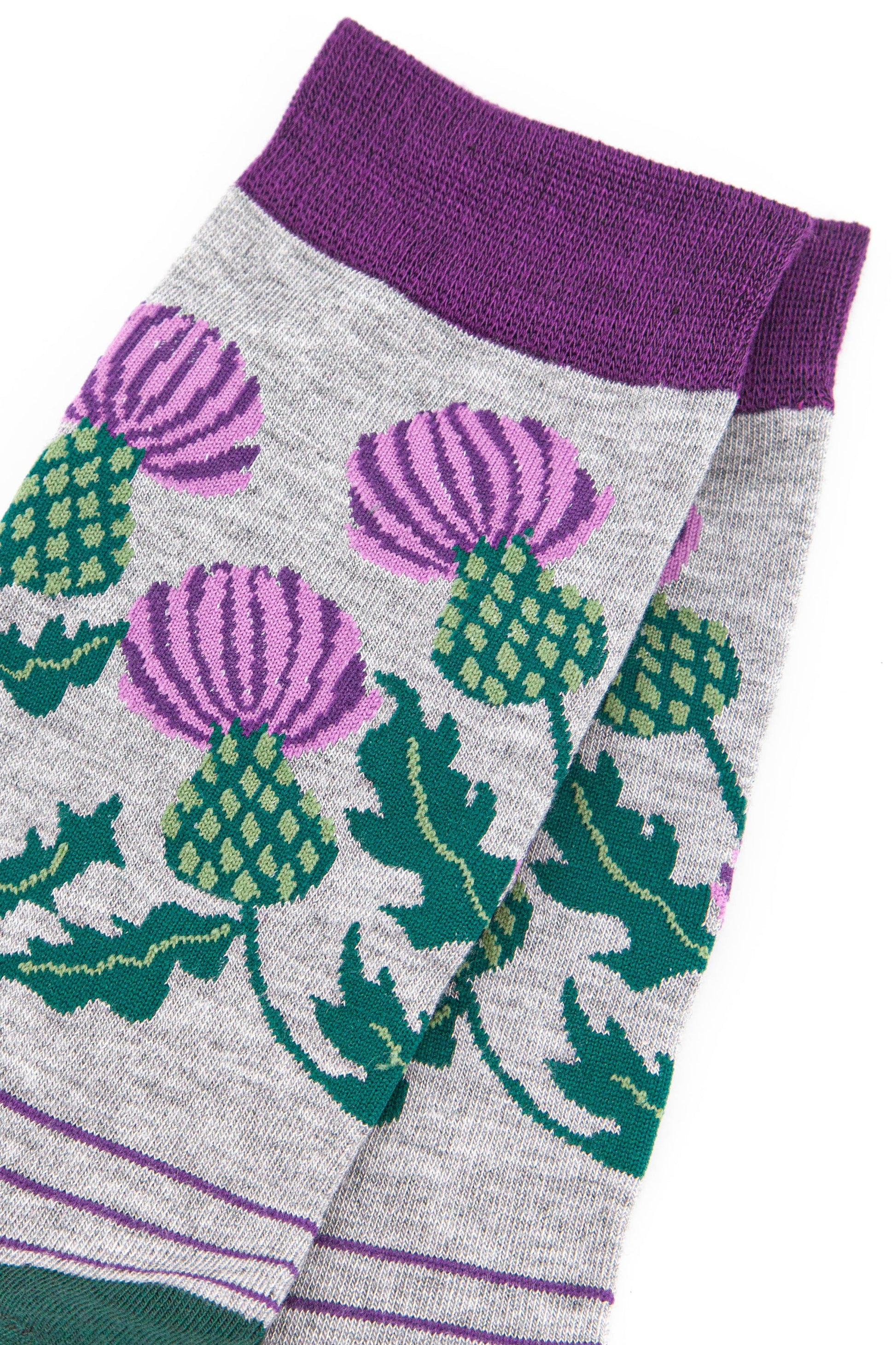 close up of the scottish thistle design on the ankle of the socks