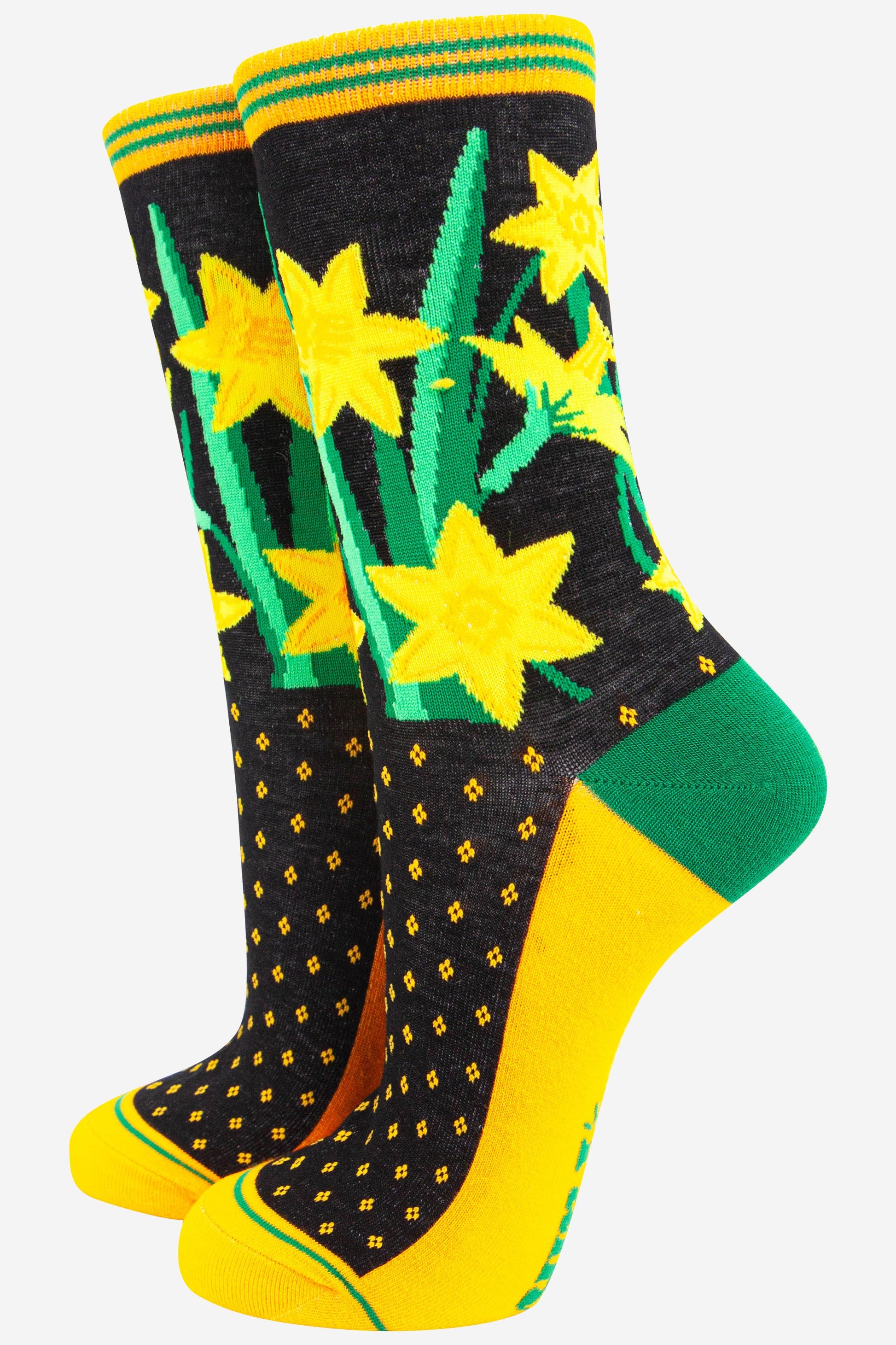 yellow and black ankle socks with a yellow daffodil floral arrangement on the ankle