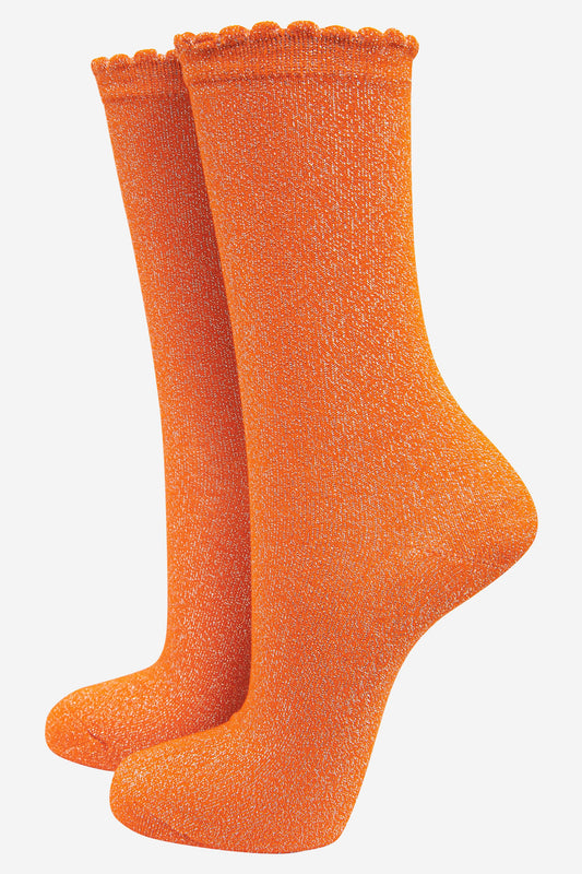 orange ankle socks with an all over glitter sparkle and scalloped cuffs
