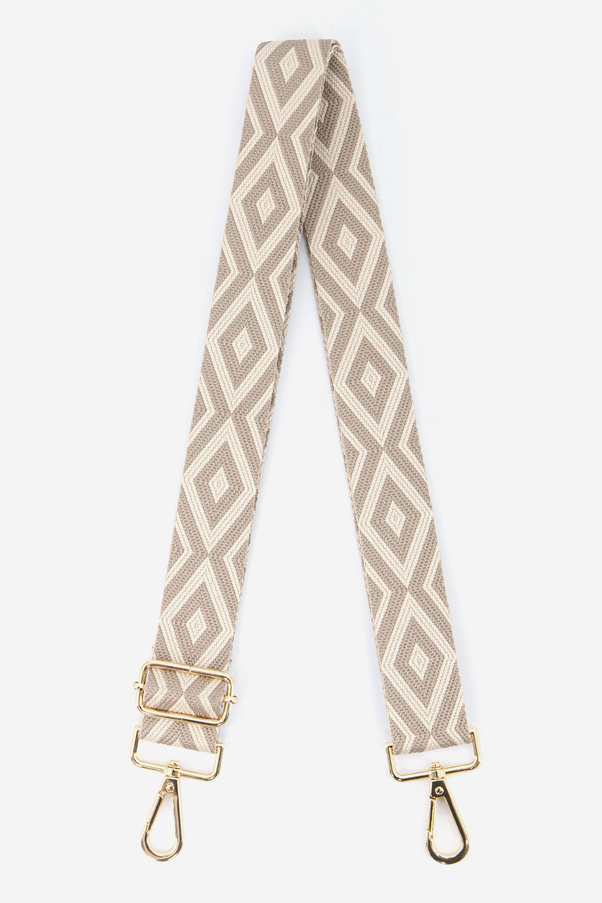 beige sand coloured ikat pattern bag strap with gold clip on snap hooks
