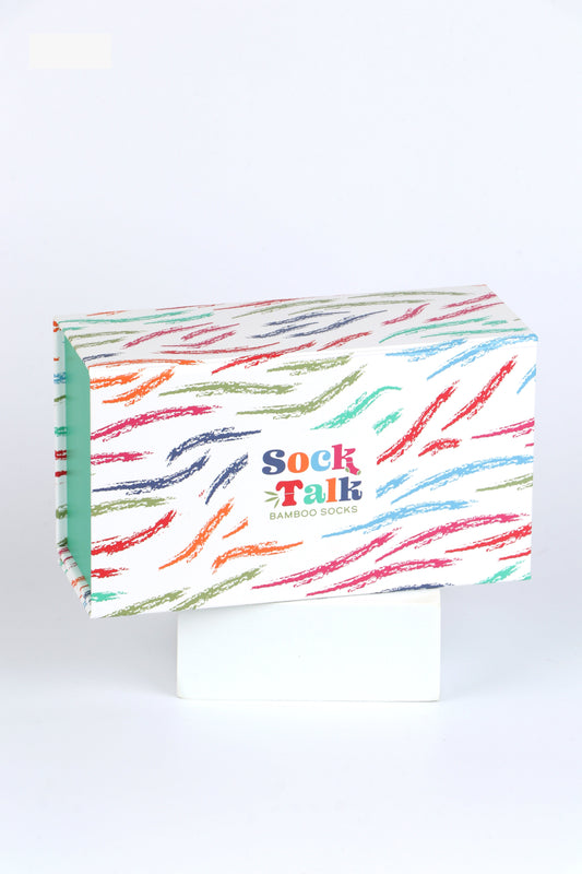 white sock talk gift box with an all over multicoloured brush stroke pattern 