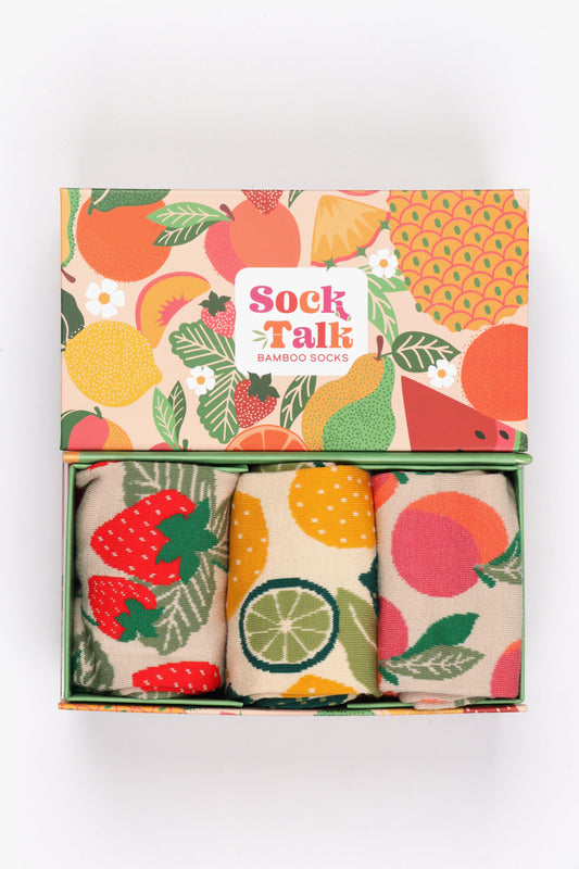 three pairs of fruit print bamboo socks in a fruit pattern gift box