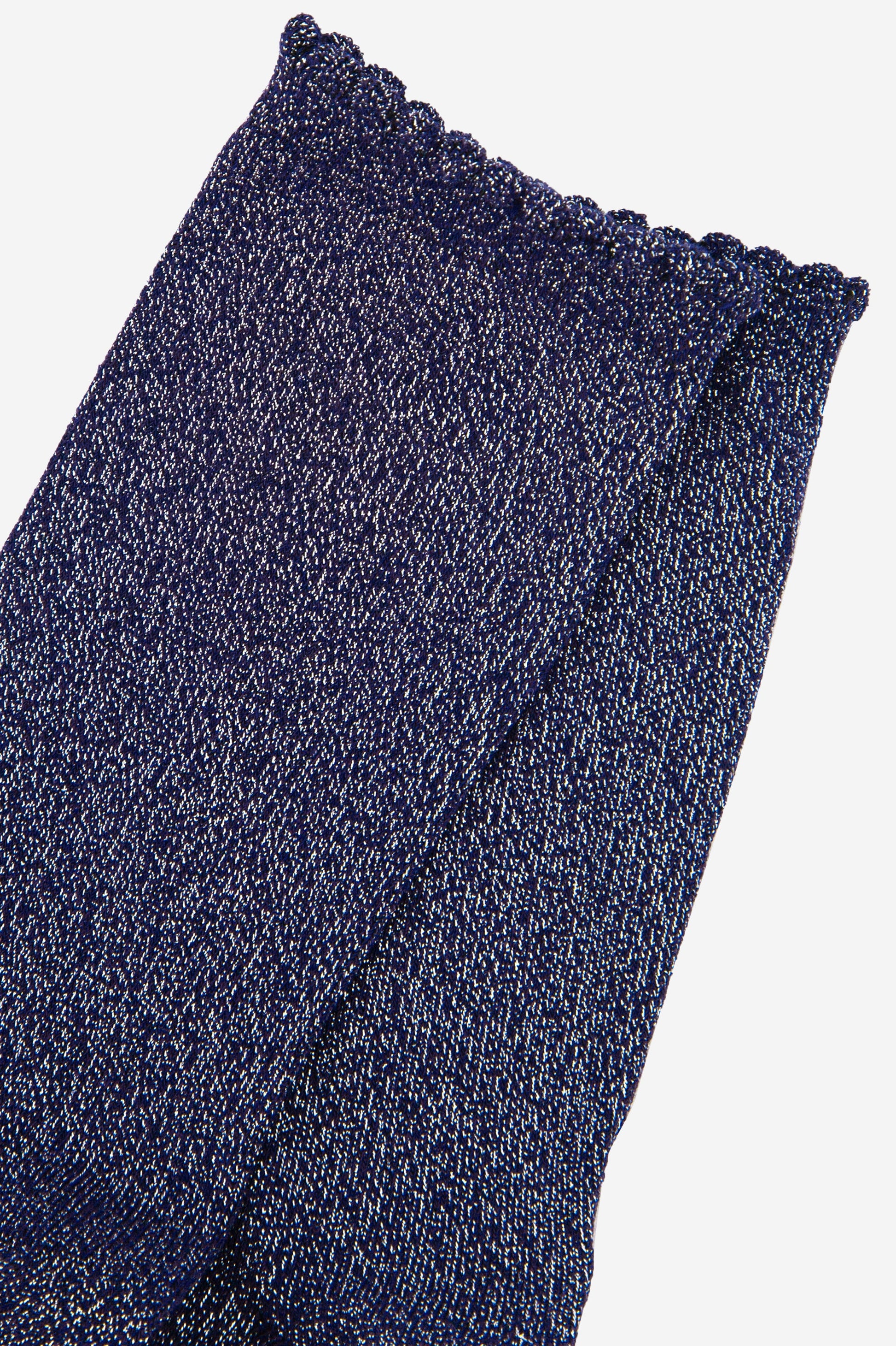 close up of the silver glitter sparkle on the navy blue ankle socks