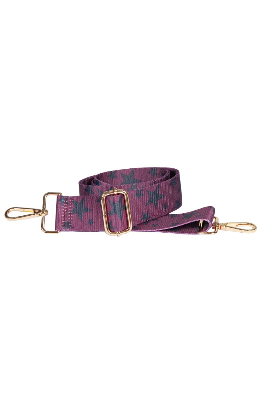 pink and black star print bag strap with gold hardware