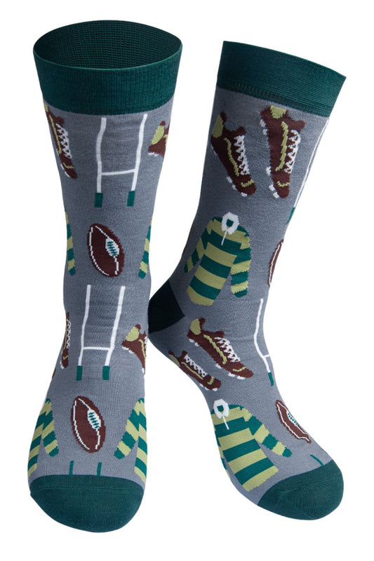 grey, green dress socks with a pattern of rugby balls, rugby shirts, goals and boots