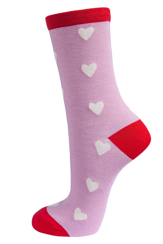 pink bamboo socks with red toe, heel and trim with all over white love hearts