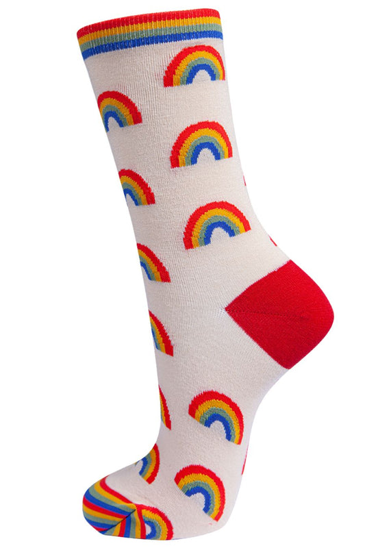 cream bamboo ankle socks with multicoloured rainbows all over and rainbow trim and toes