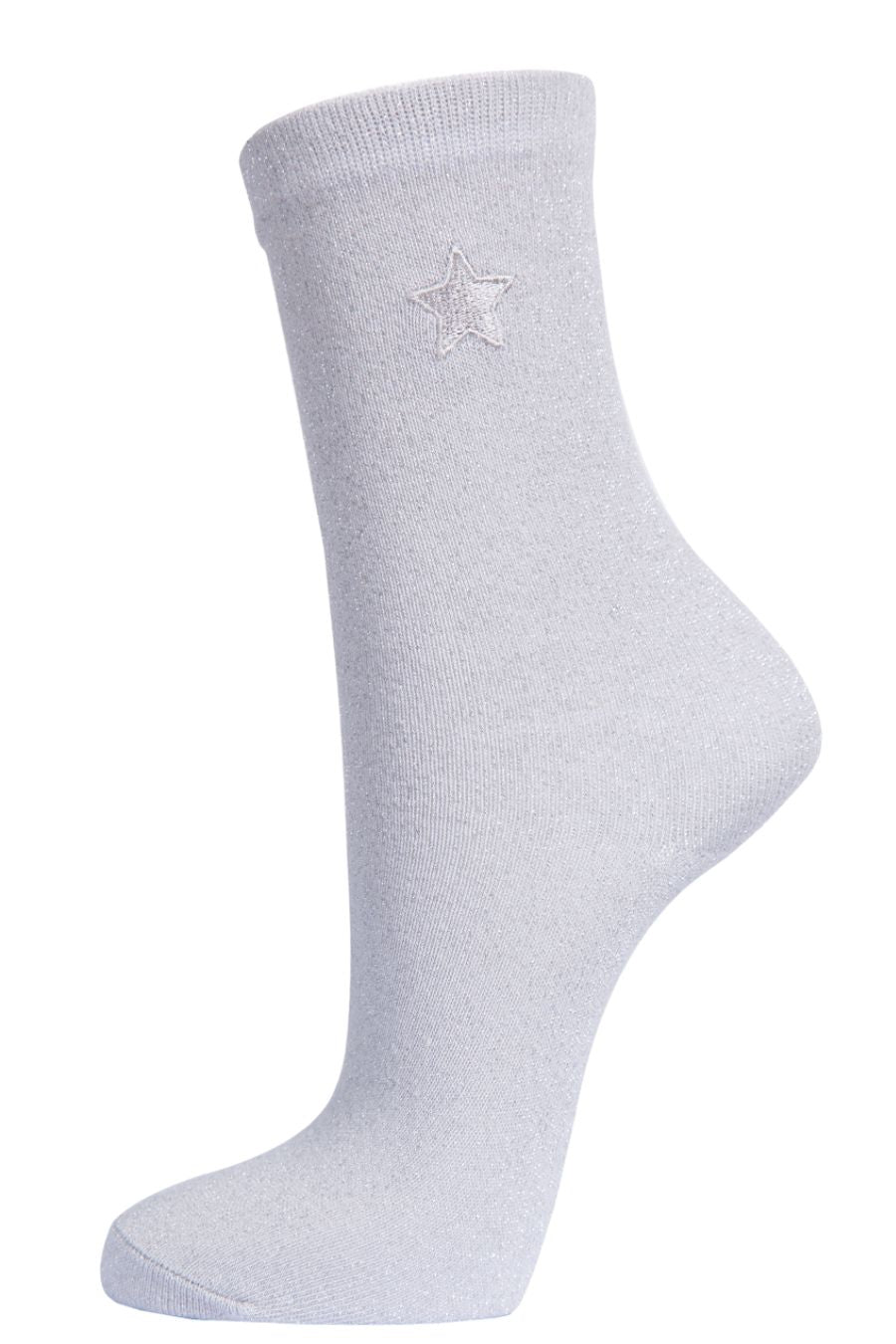 white and silver glitter socks with an embroidered star on the ankle