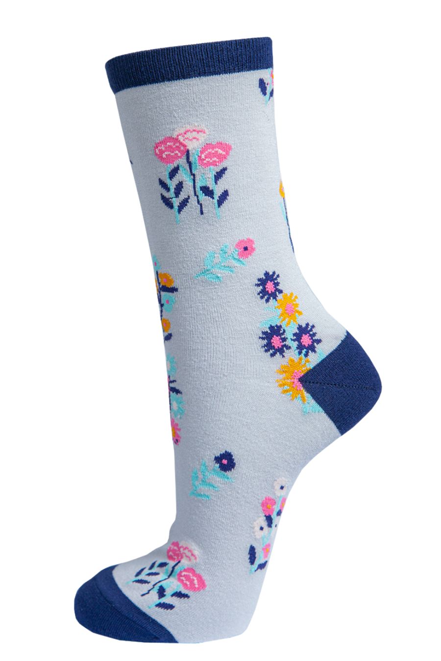 grey, navy blue ankle socks with an all over multicoloured ditsy floral pattern
