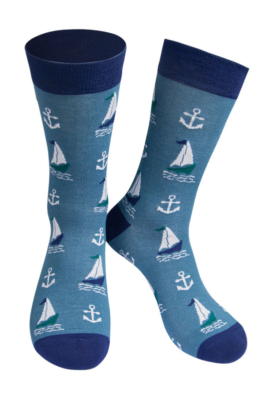 Mens blue bamboo socks with white sailing boats and anchors.