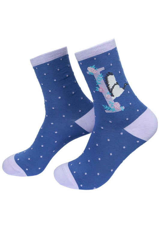 blue, lilac ankle socks with the letter I and an Ibis bird